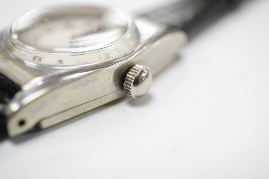 A gentleman's mid 20th century stainless steel Rolex manual wind wrist watch, with Arabic dial and Rolex and Enivar movement, case diameter 24mm, on a later associated leather strap. Condition - poor to fair